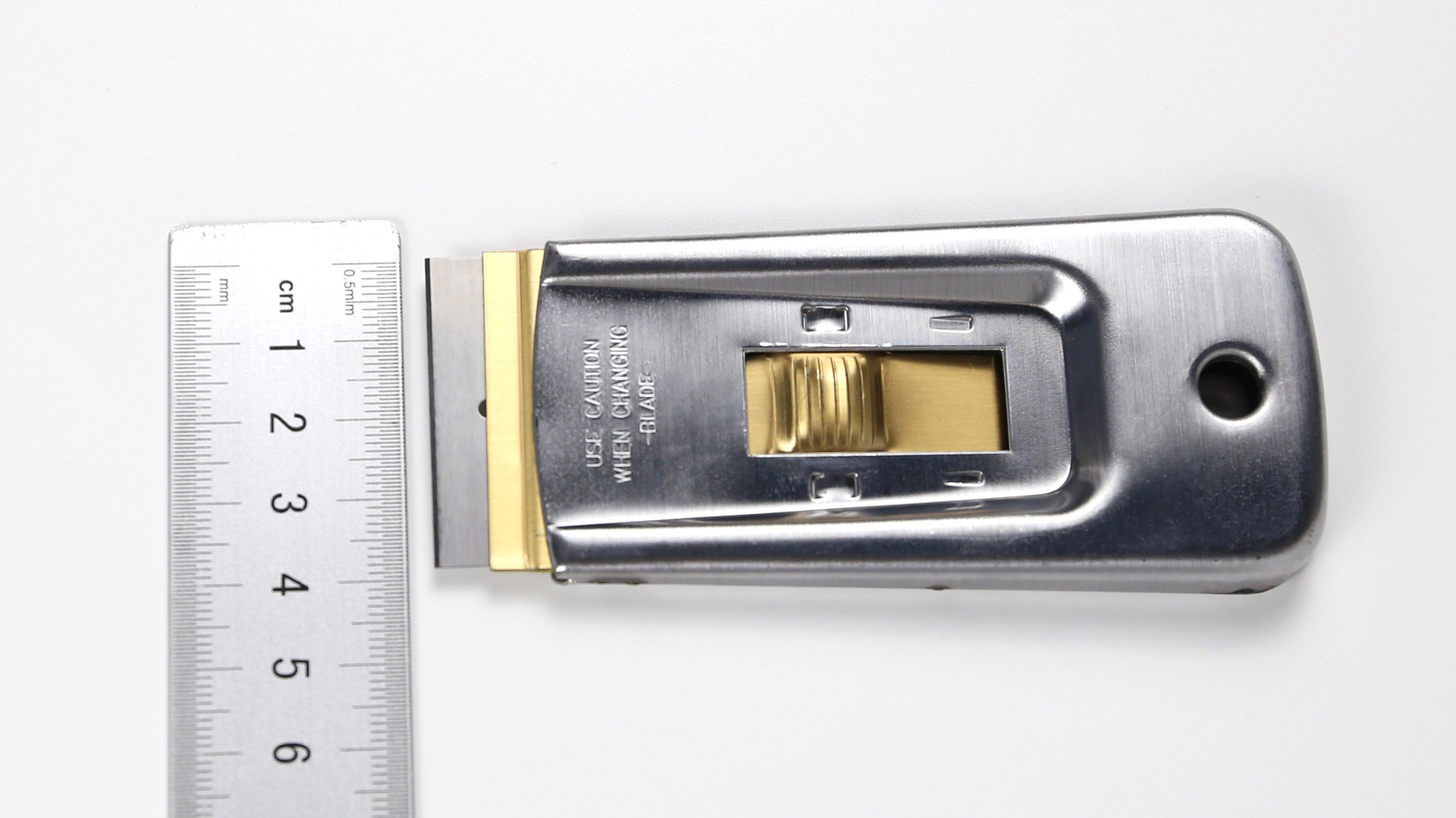 1.5 in. standard single edge razor blade retracts for safe storage